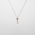 Pearl  pendant necklace on a white background