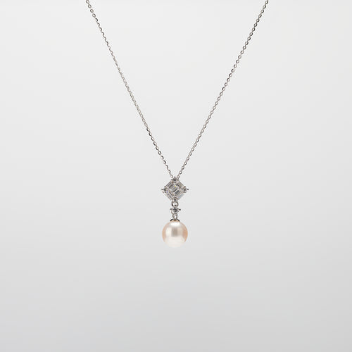 Pearl  pendant necklace on a white background