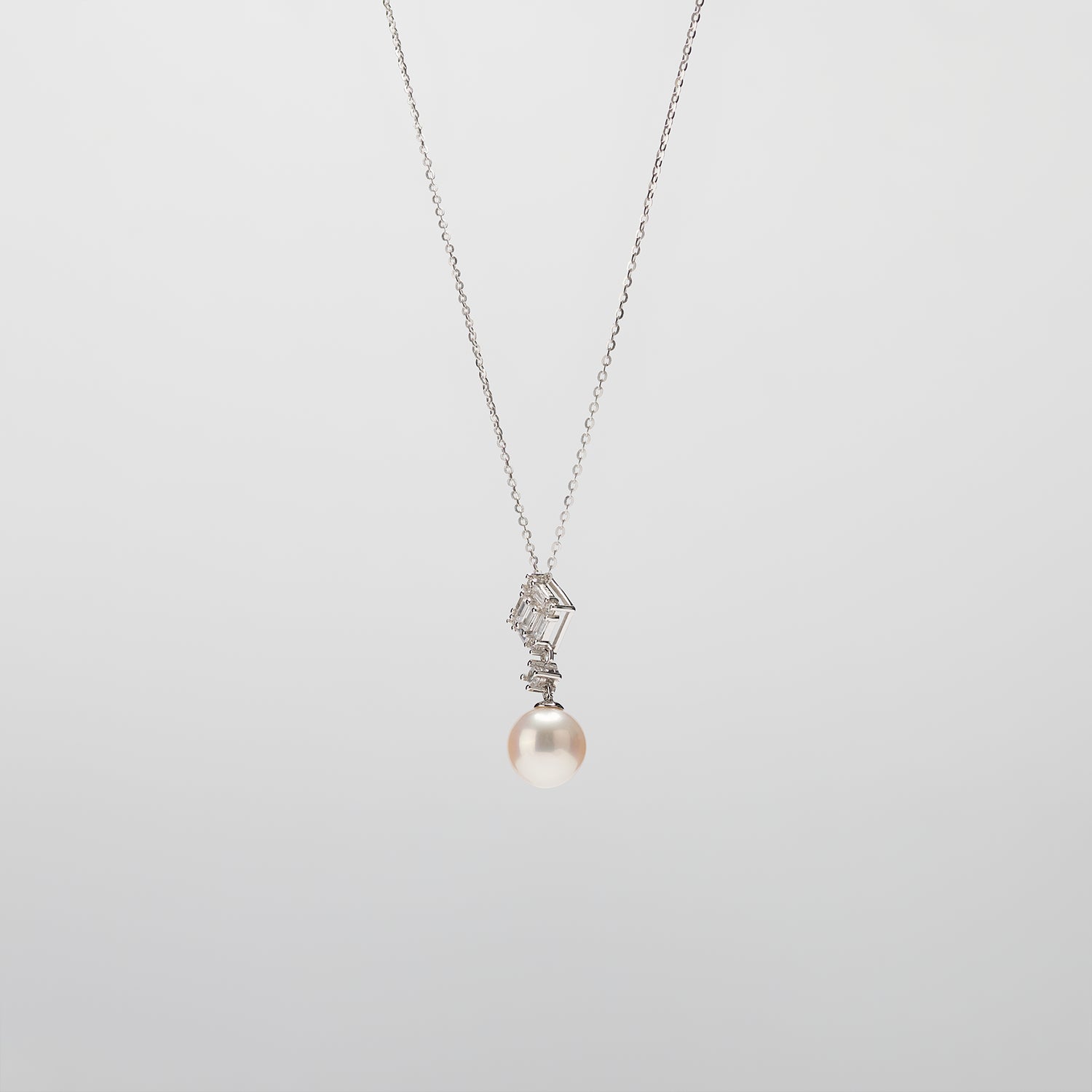 Pearl  pendant necklace on a white background