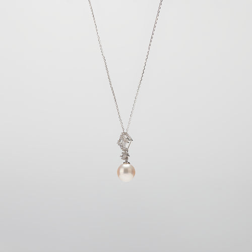Pearl  pendant necklace on a white background
