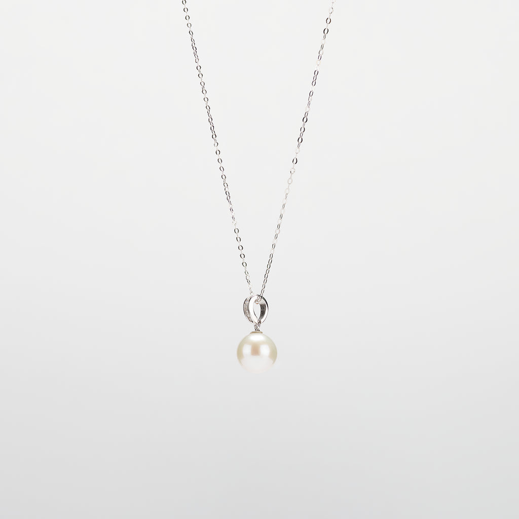 Pearl  pendant necklace on a white background
