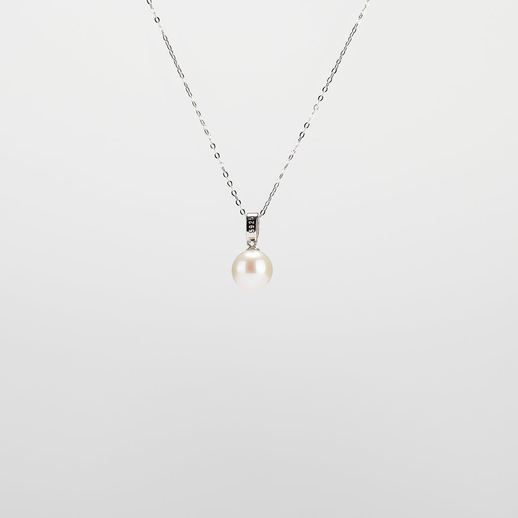 Pearl  pendant necklace on a white background