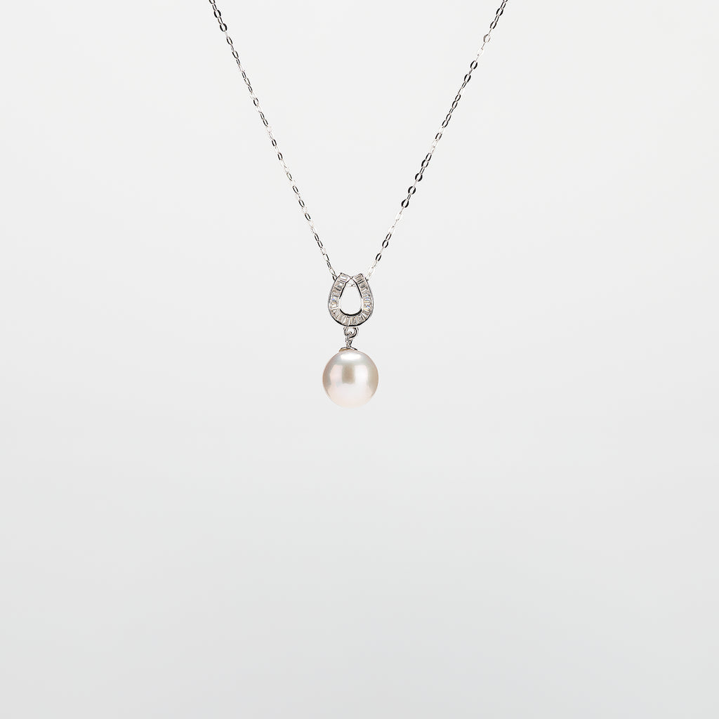 Pearl  pendant necklace on a white background