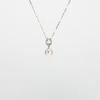Pearl  pendant necklace on a white background