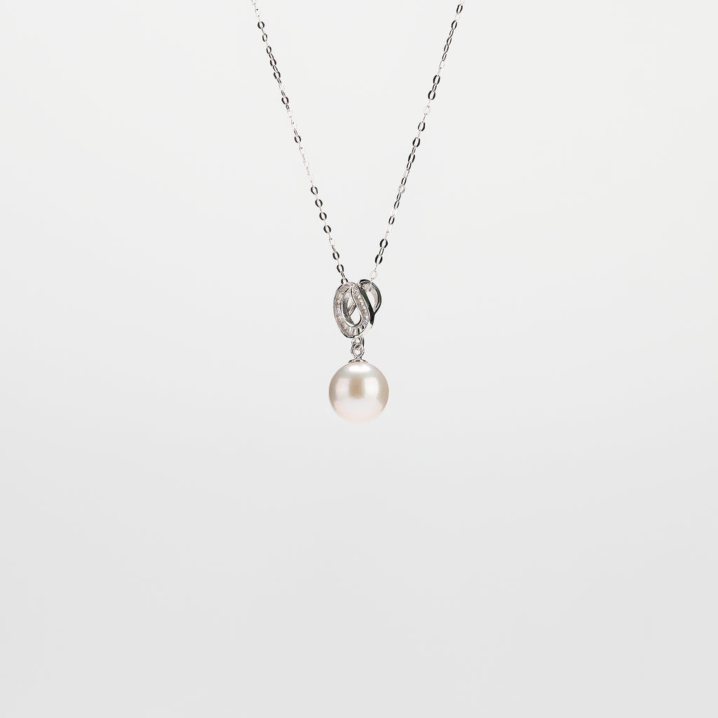 Pearl  pendant necklace on a white background