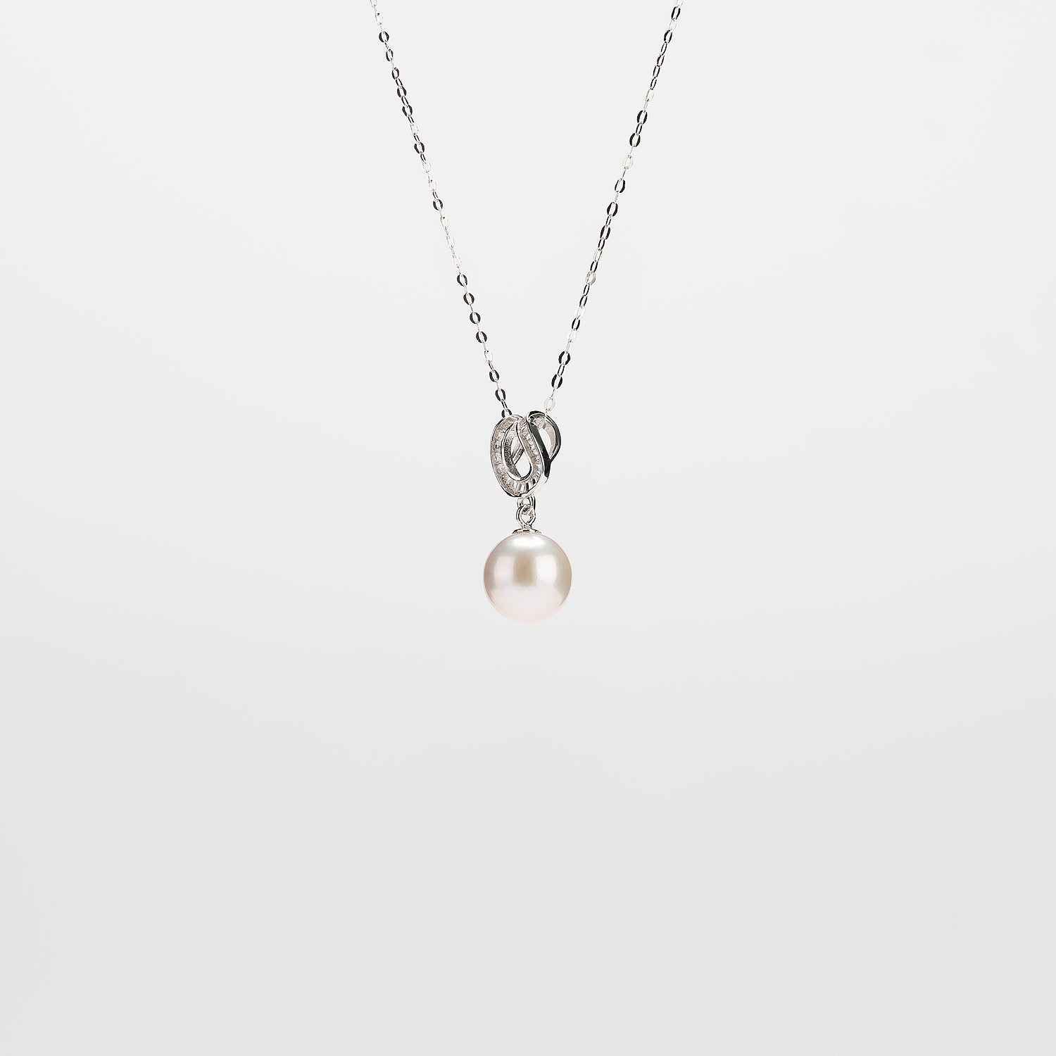 Pearl  pendant necklace on a white background