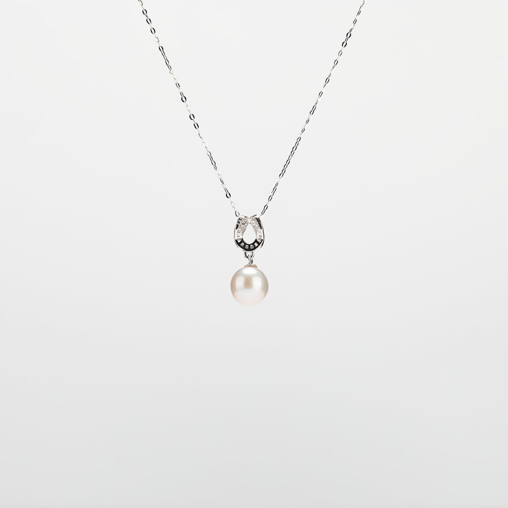 Pearl  pendant necklace on a white background
