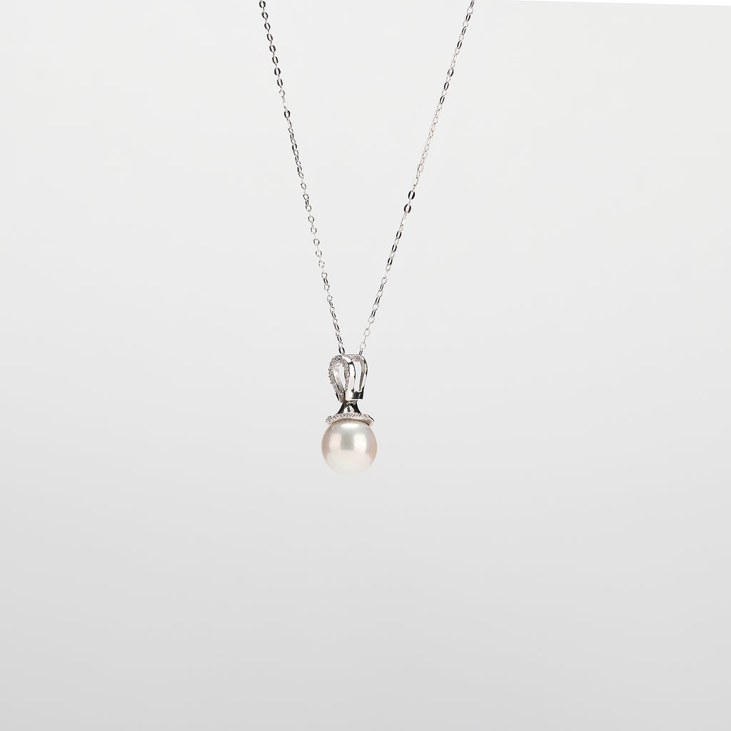 Pearl  pendant necklace on a white background