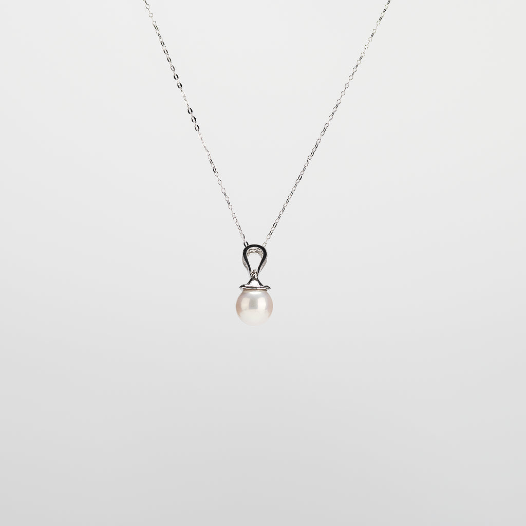 Pearl  pendant necklace on a white background