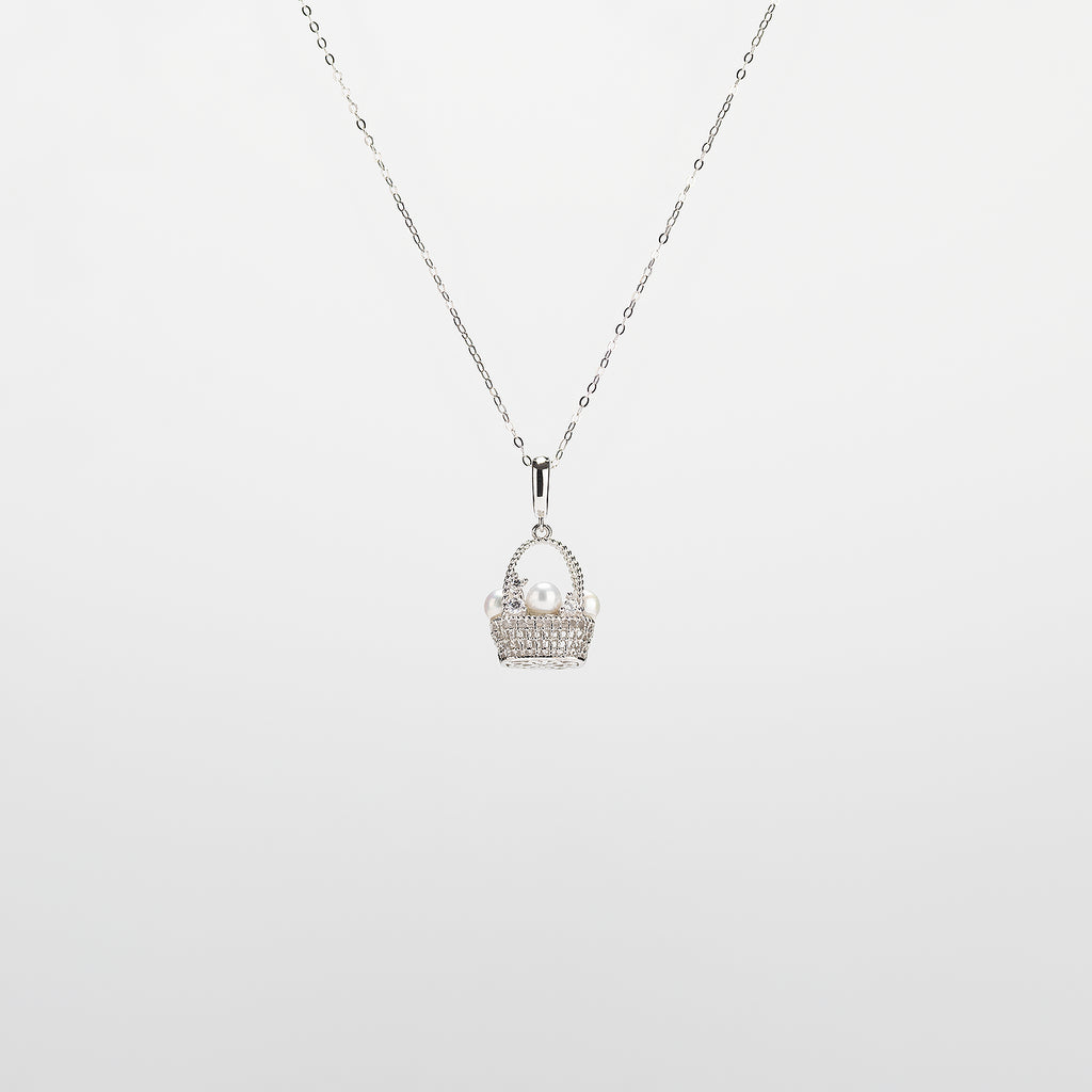 Pearl  pendant necklace on a white background