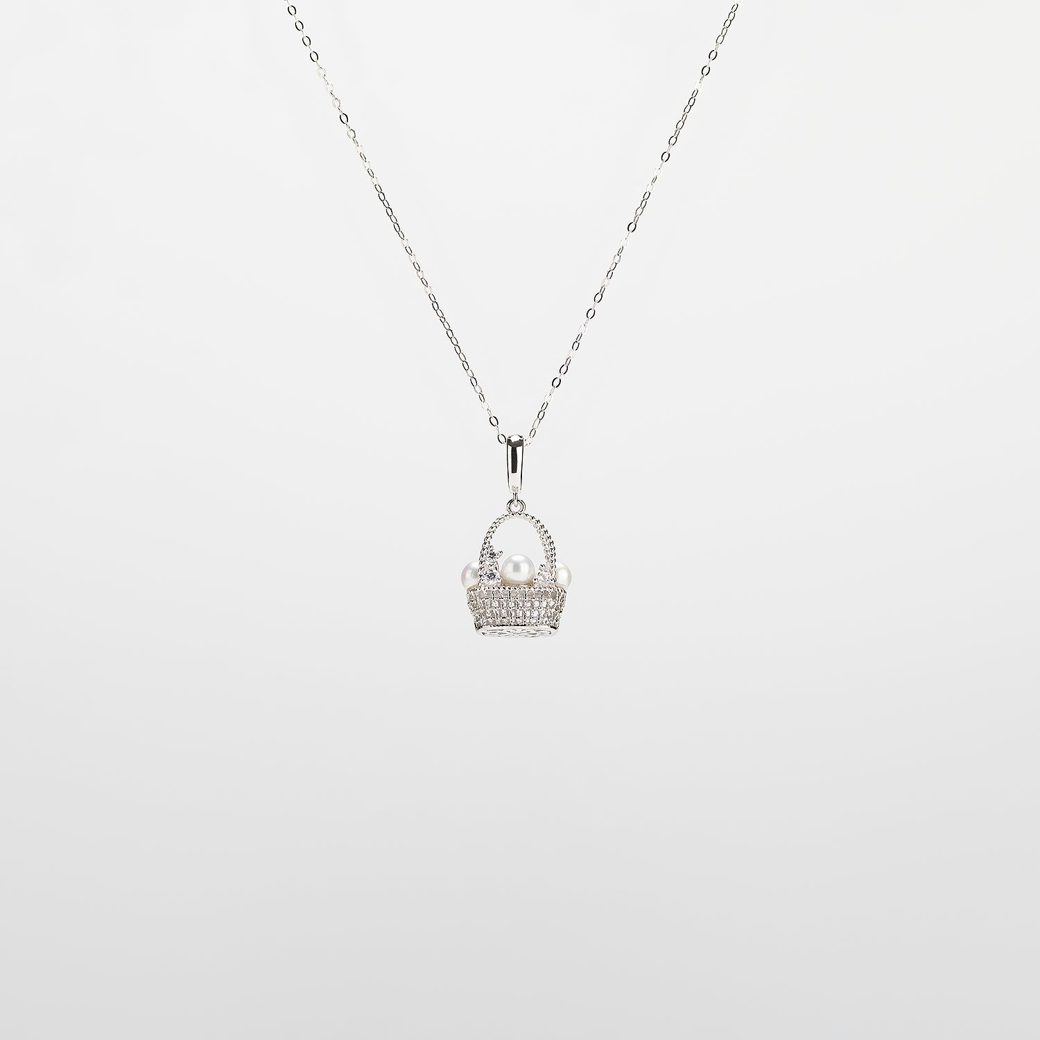 Pearl  pendant necklace on a white background