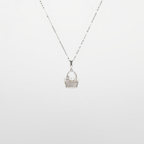 Pearl  pendant necklace on a white background