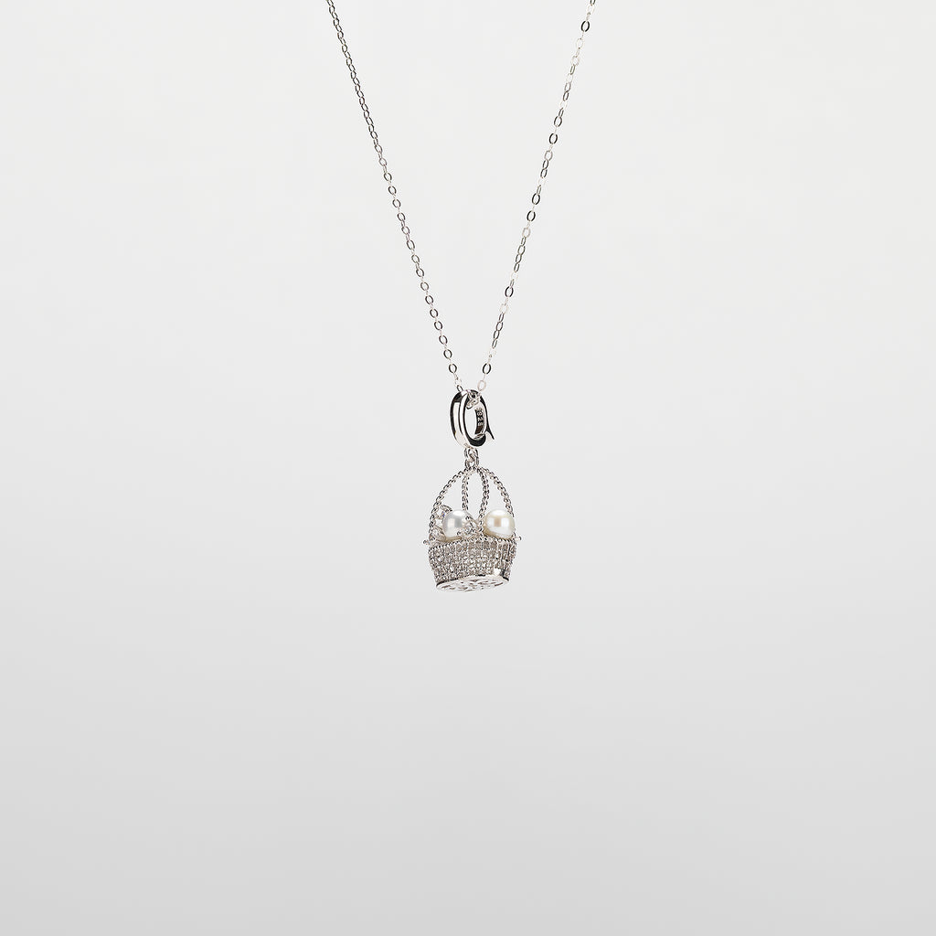 Pearl  pendant necklace on a white background