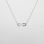 Pearl  pendant necklace on a white background