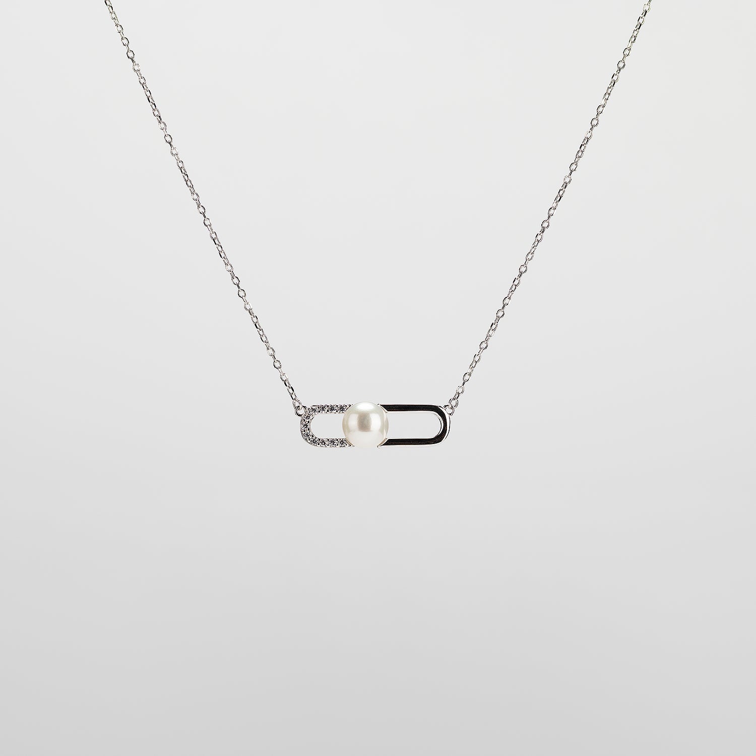Pearl  pendant necklace on a white background