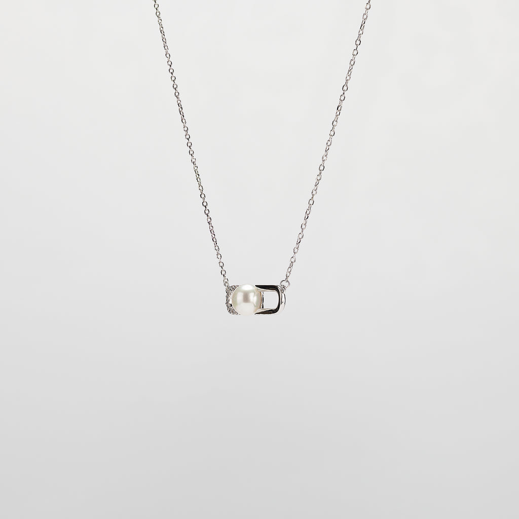 Pearl  pendant necklace on a white background