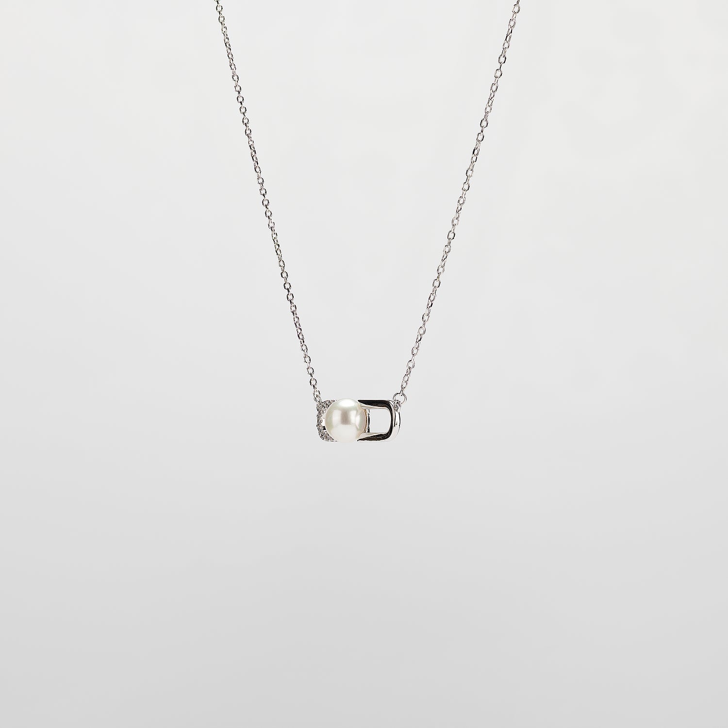 Pearl  pendant necklace on a white background