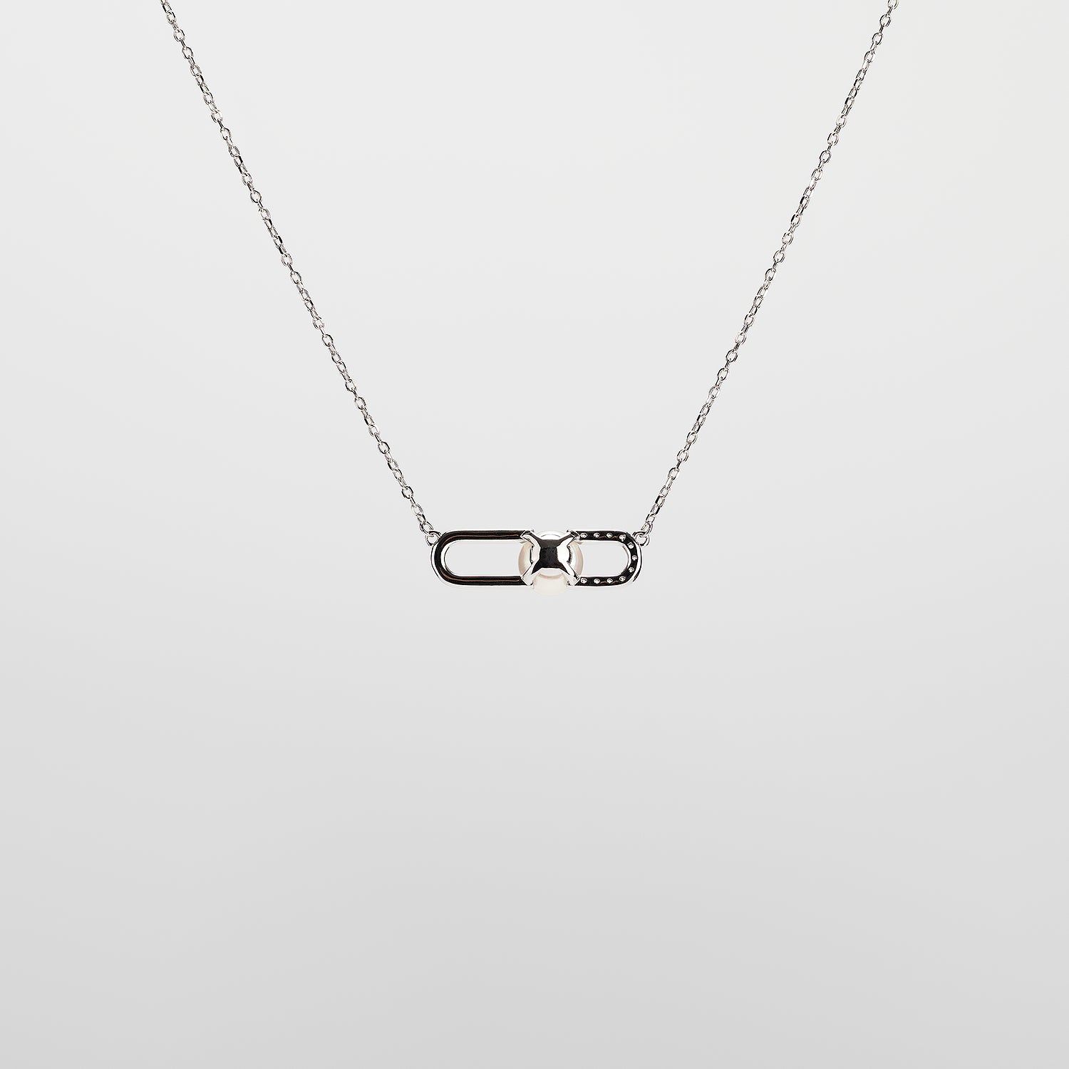 Pearl  pendant necklace on a white background