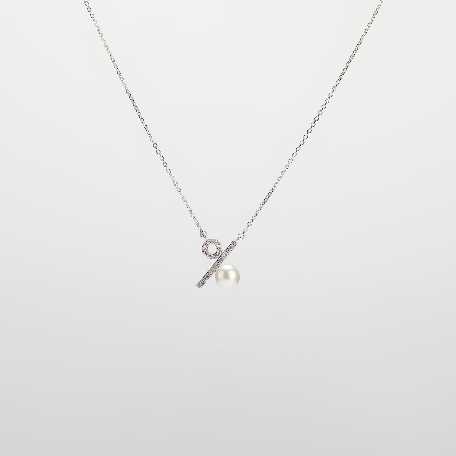 Pearl  pendant necklace on a white background