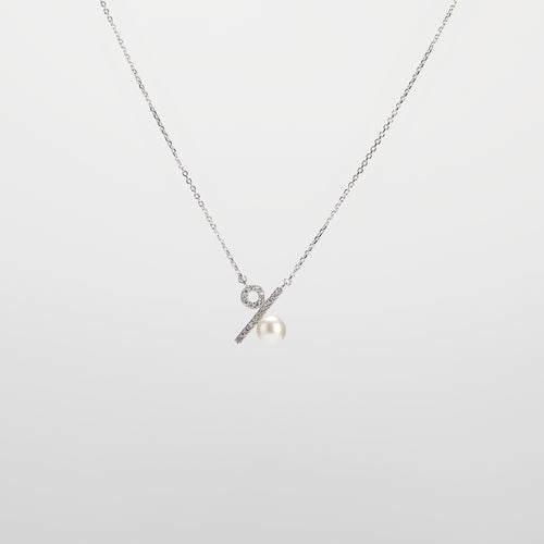 Pearl  pendant necklace on a white background