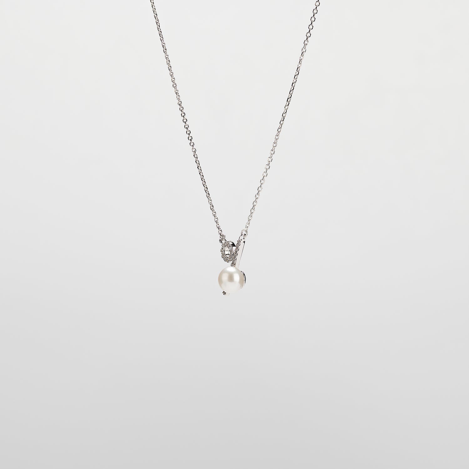Pearl  pendant necklace on a white background
