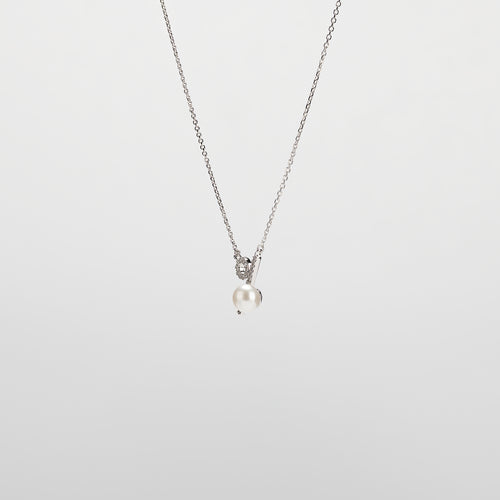 Pearl  pendant necklace on a white background