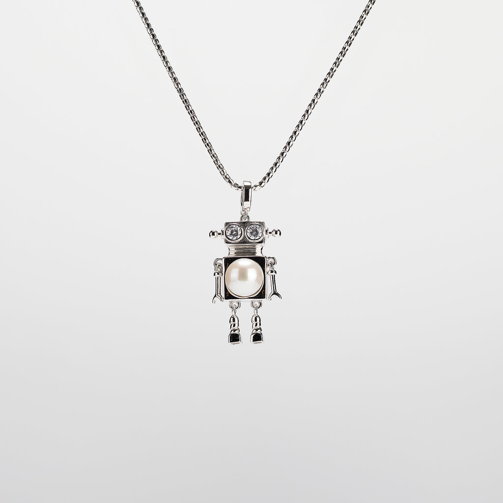 A robot-shaped pearl  pendant necklace on a white background