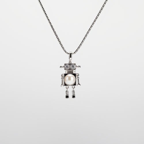 A robot-shaped pearl  pendant necklace on a white background