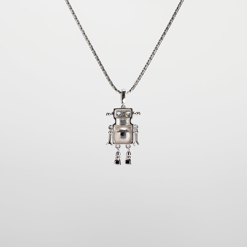 A robot-shaped pearl  pendant necklace on a white background