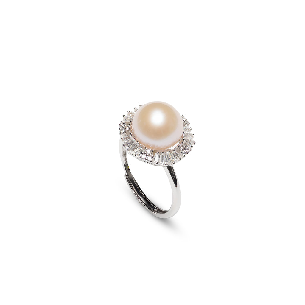 Pearl ring with cubic zirconia  on a white background