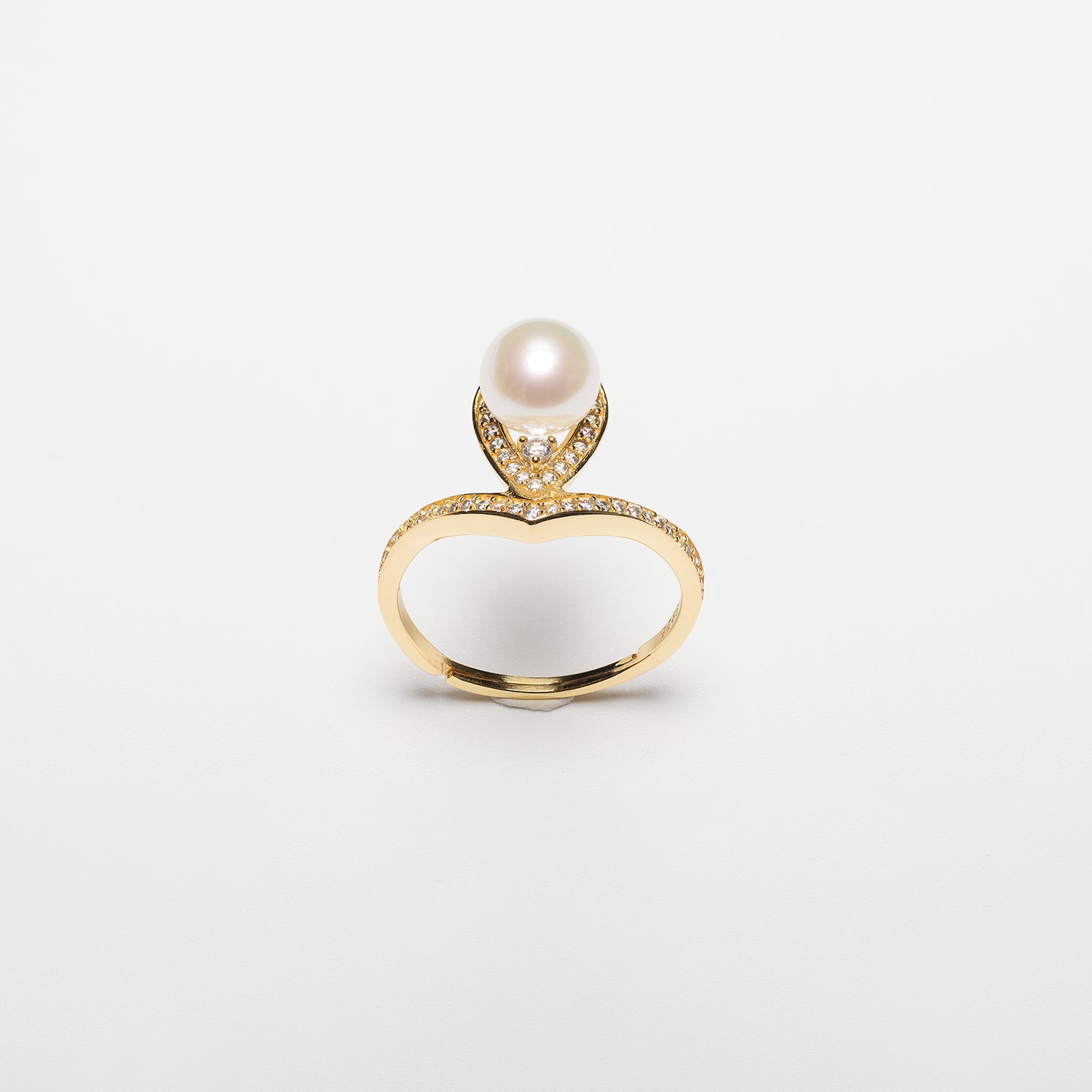 Pearl ring on a white background