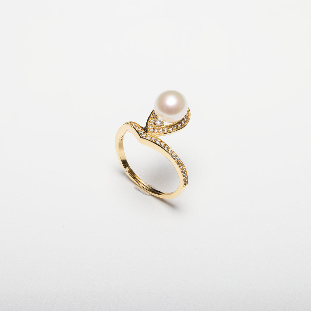 Pearl ring on a white background