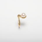 Pearl ring on a white background