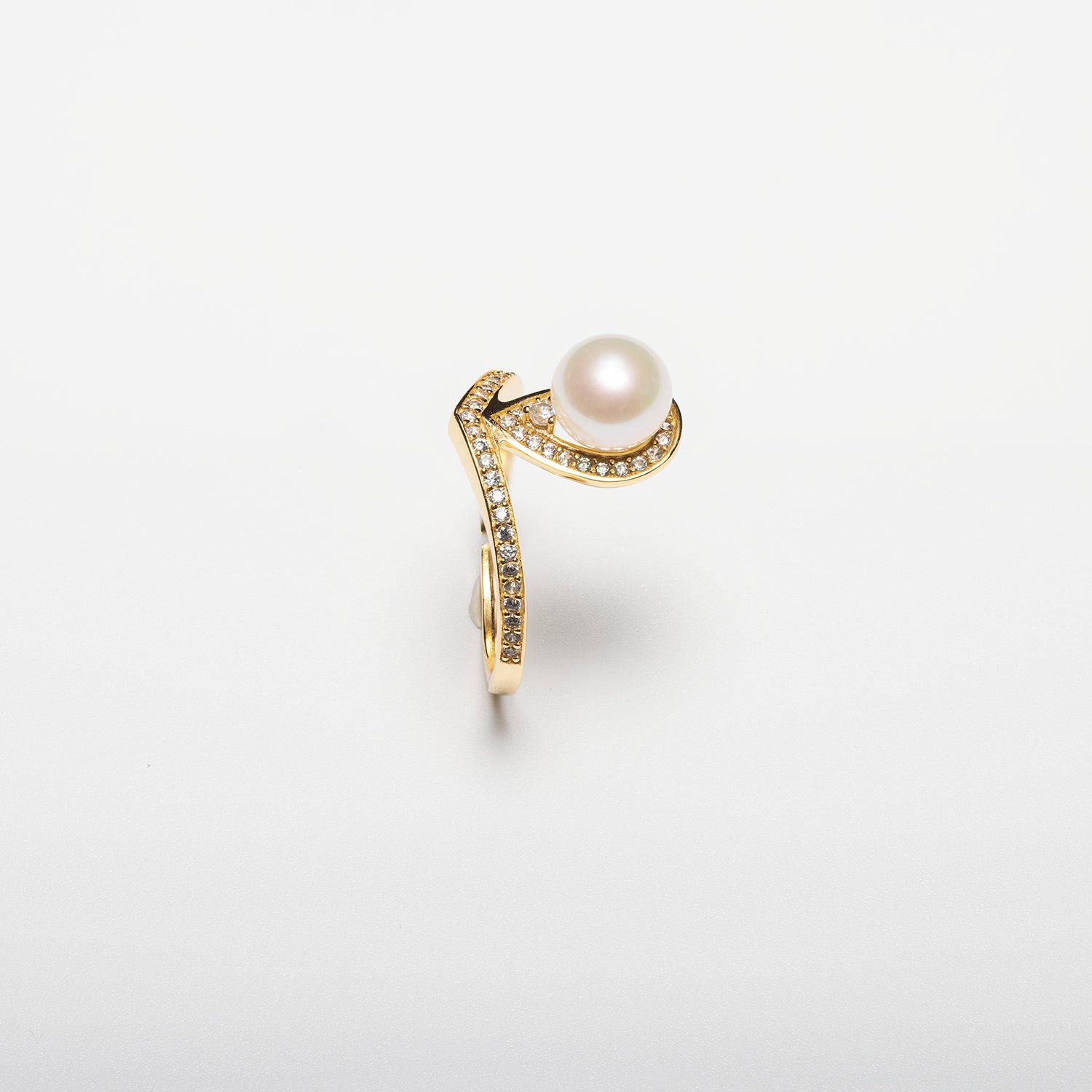 Pearl ring on a white background